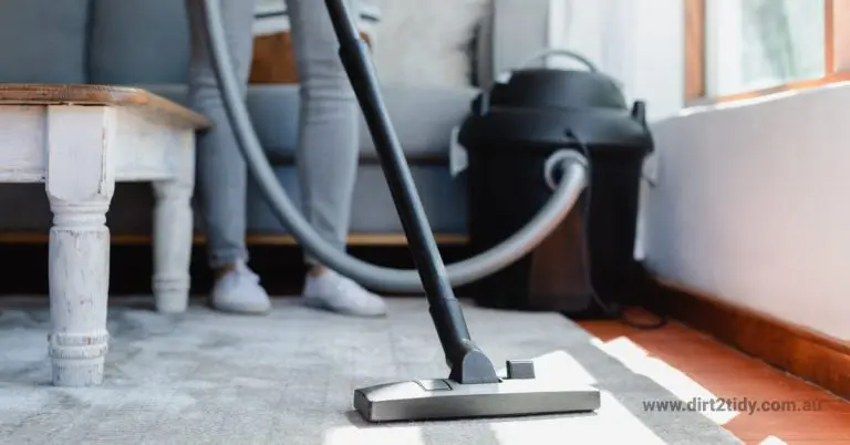 What are the tips for the end of lease cleaning? 7 Vacuum cleaner cleaning the carpet in the living room.