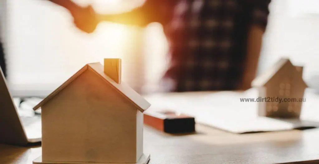 Handshake with model house