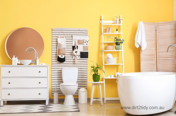 How do people design a bathroom to be easy to clean? 2 cleaning a bathroom