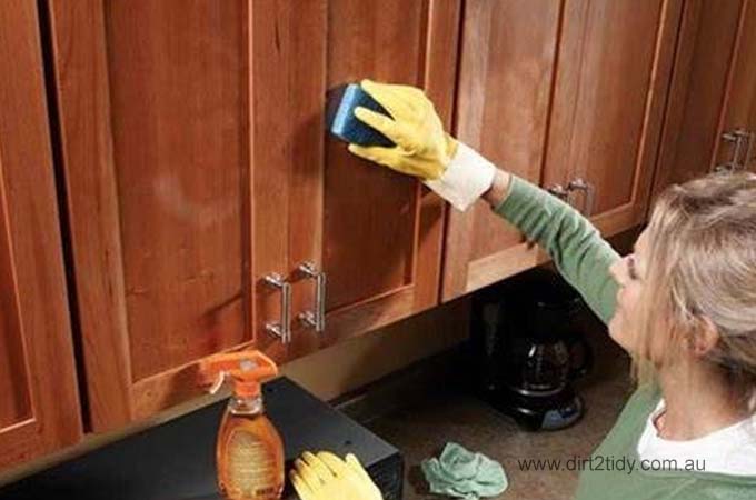 How can we clean wooden doors of kitchen cabinets? 2 kitchen cabinets
