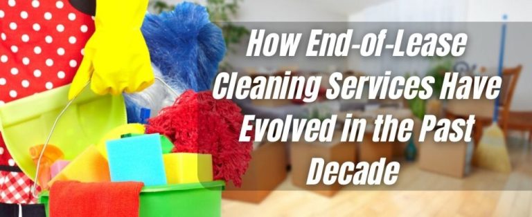 Colorful cleaning tools in a bucket with a background of a room ready for end-of-lease inspection.